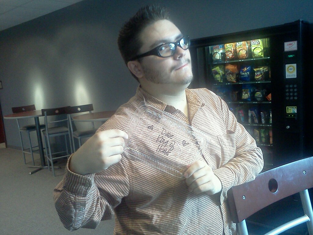 Dave holding his 'Dave King of Hearts' Thai Fusion box lid.